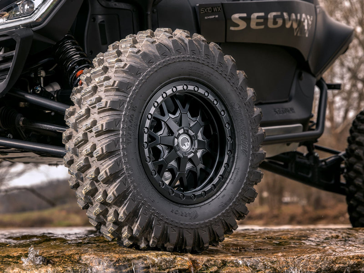 Standard XT Warrior Tires 30x10x15 on 15x10 Assault Industries Hellfire Matte Titanium Wheels 4/136 Pattern